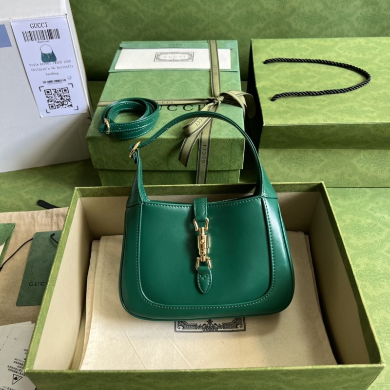 G*u*i top handle bags